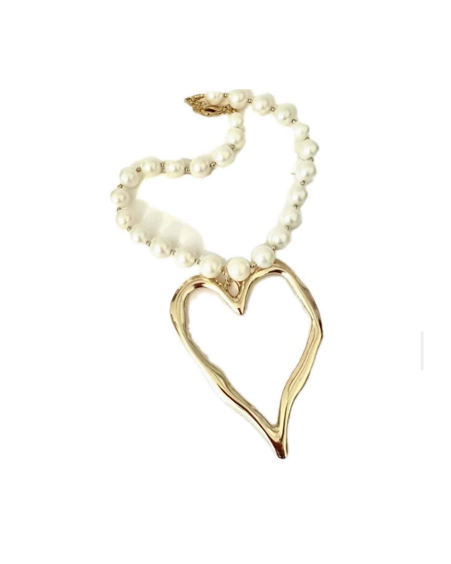 Big cross small pearls