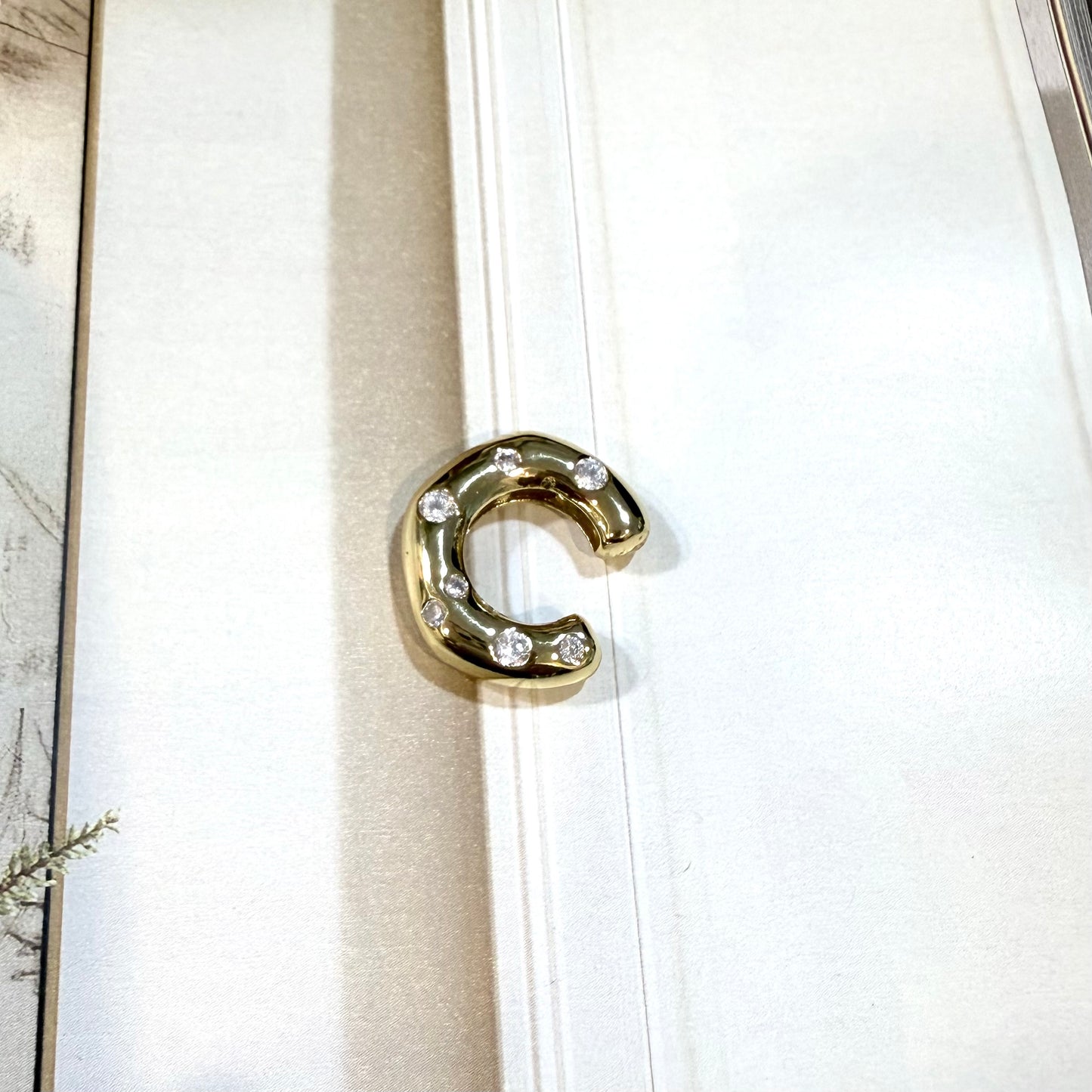 Gold and crystals ear cuff